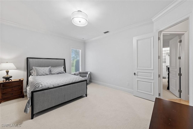 bedroom with ornamental molding, light carpet, visible vents, and baseboards