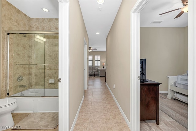 hallway featuring light tile patterned floors