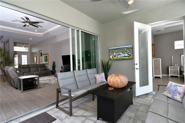 view of patio / terrace with an outdoor living space and ceiling fan