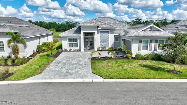 view of front of property with a front lawn