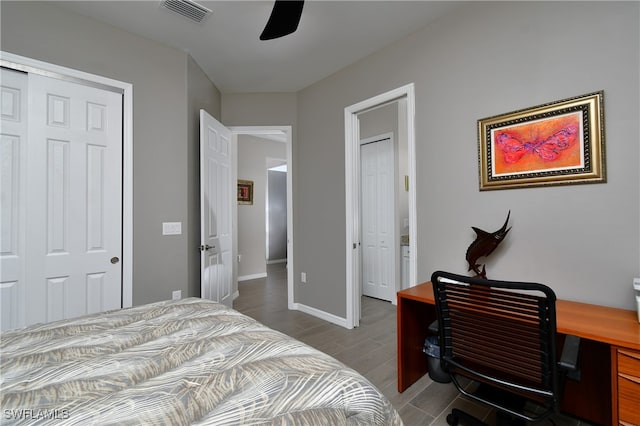 bedroom with ceiling fan, hardwood / wood-style floors, and a closet