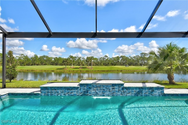 view of pool with glass enclosure, pool water feature, and a water view