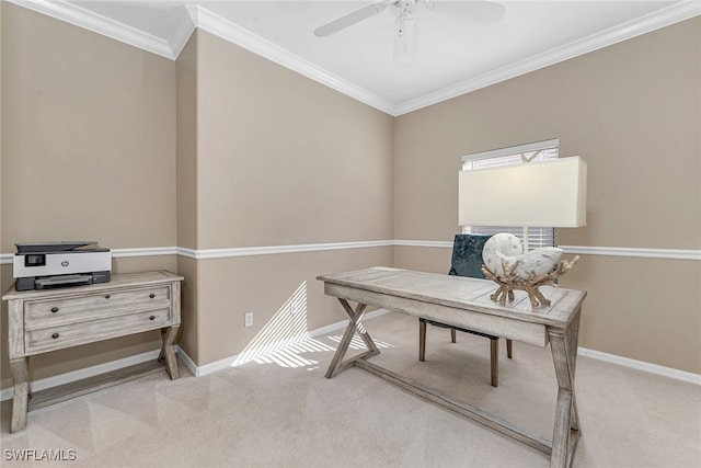 office space featuring crown molding, light colored carpet, and ceiling fan