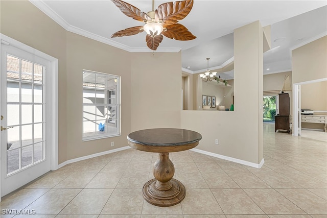 tiled dining space featuring crown molding and ceiling fan with notable chandelier