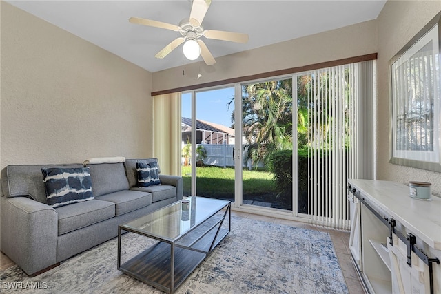 living room featuring ceiling fan