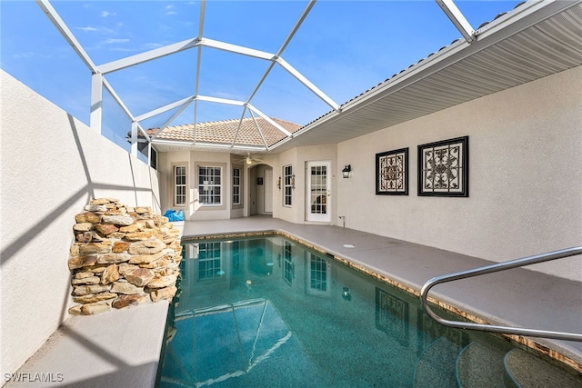 view of pool featuring a patio and a lanai