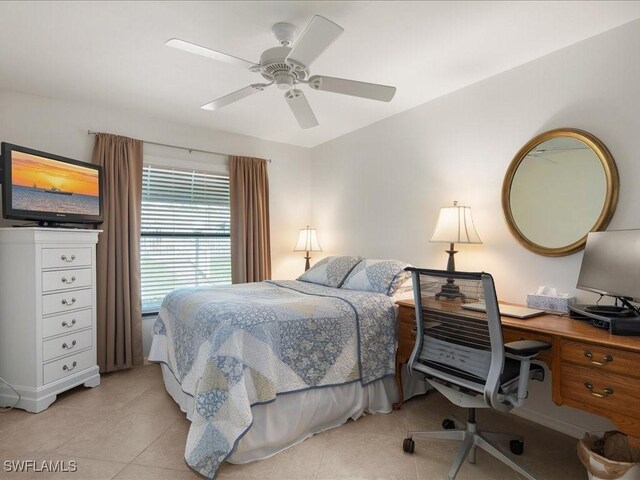 bedroom featuring light tile patterned floors and ceiling fan