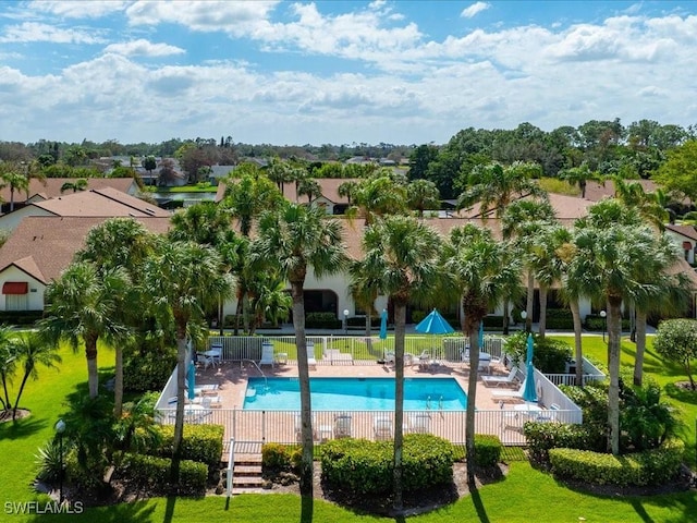 view of swimming pool with a patio area