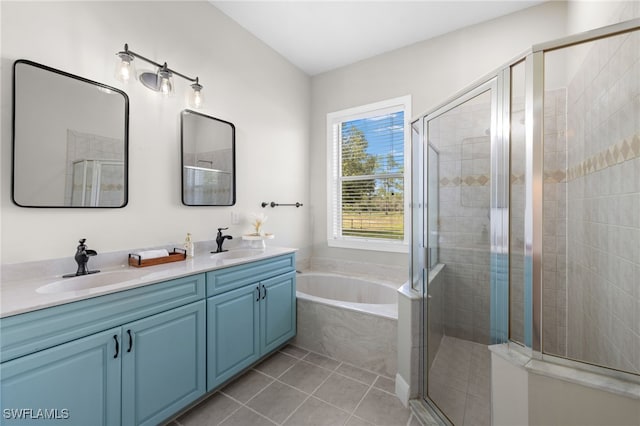 bathroom featuring independent shower and bath, vanity, and tile patterned flooring