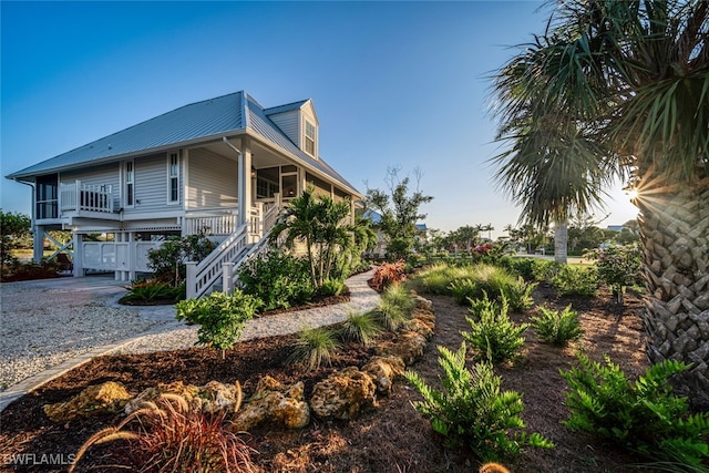 view of home's exterior with covered porch