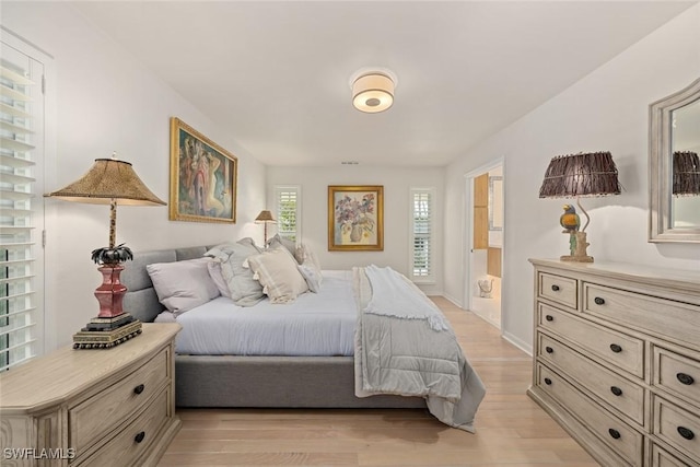 bedroom featuring light hardwood / wood-style floors