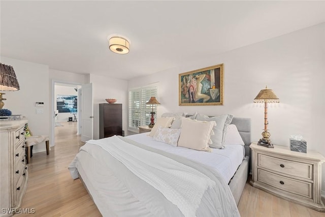 bedroom with light hardwood / wood-style flooring