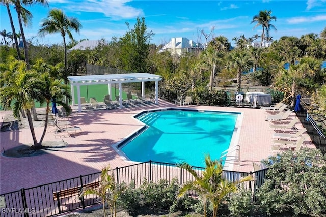 view of swimming pool with a pergola and a patio area