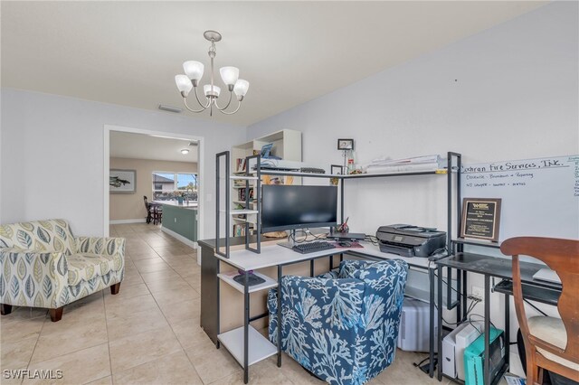 office area with a notable chandelier and light tile patterned flooring