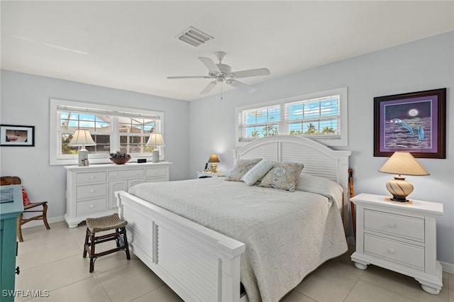 bedroom with light tile patterned floors and ceiling fan