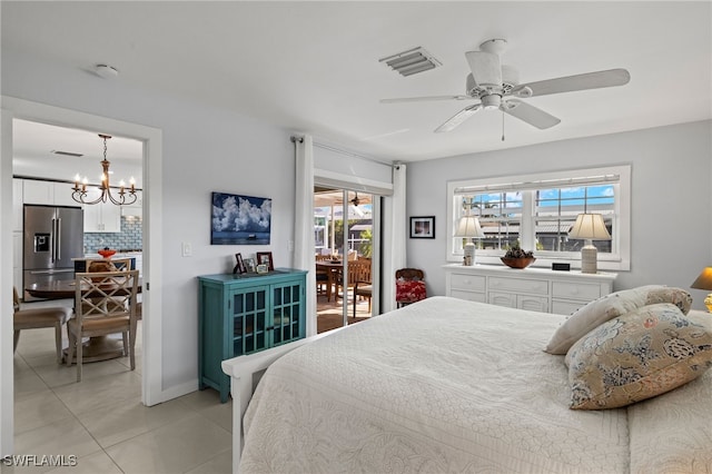 tiled bedroom with ceiling fan with notable chandelier, access to exterior, and stainless steel refrigerator with ice dispenser