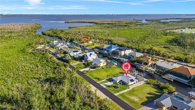 bird's eye view with a water view