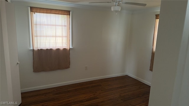 unfurnished room with ceiling fan, dark hardwood / wood-style flooring, and ornamental molding