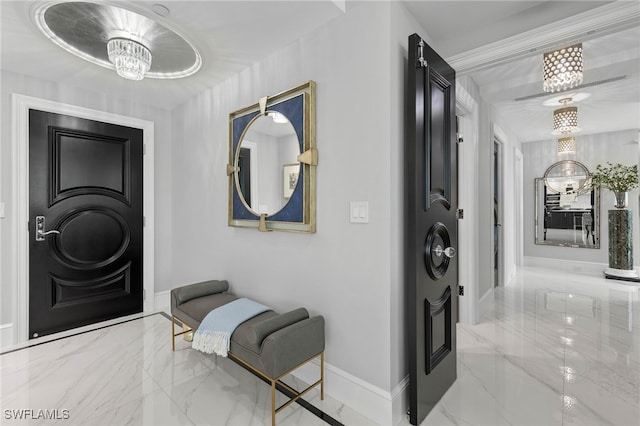 hallway featuring an inviting chandelier