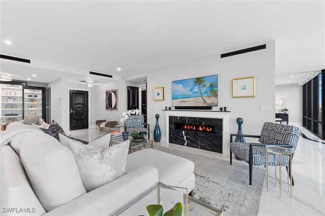 3971 Gulf Shore Blvd N Unit 1505, Naples, FL 34103 - living area featuring a high end fireplace and recessed lighting