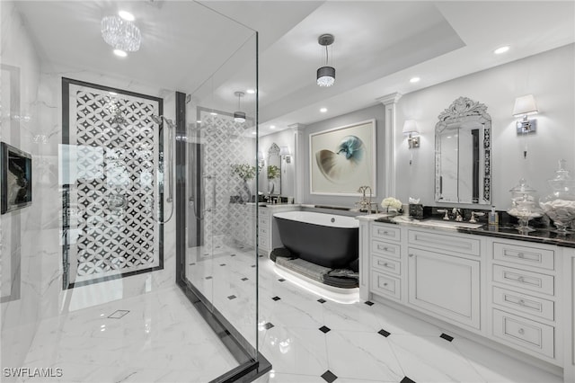 3971 Gulf Shore Blvd N Unit 1505, Naples, FL 34103 - bathroom featuring recessed lighting, a shower stall, a soaking tub, vanity, and decorative columns
