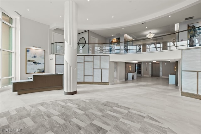 3971 Gulf Shore Blvd N Unit 1505, Naples, FL 34103 - lobby featuring a towering ceiling and recessed lighting