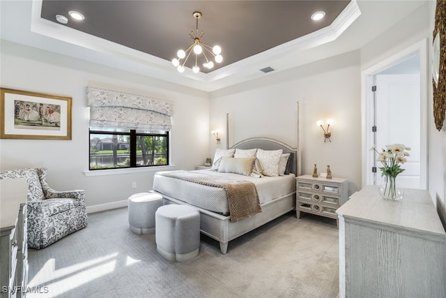 bedroom featuring ornamental molding, carpet, and a tray ceiling