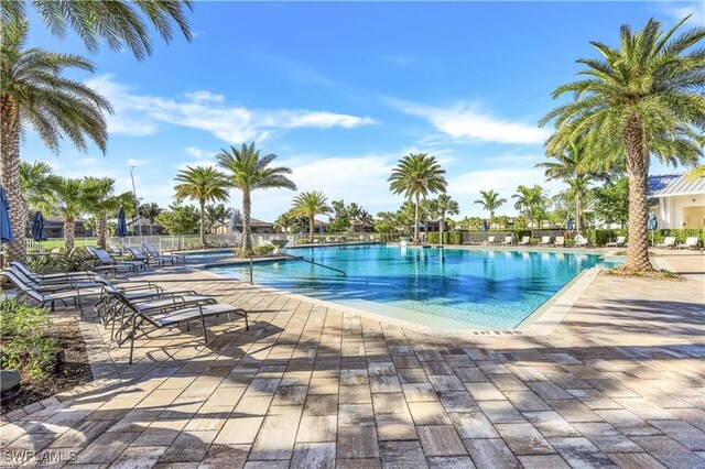 view of swimming pool with a patio area