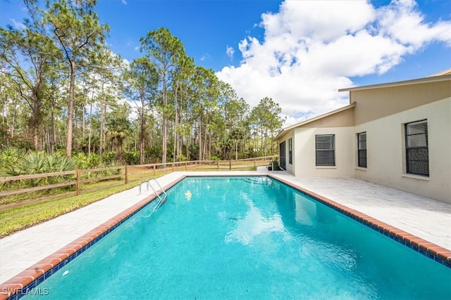 view of pool with a patio area