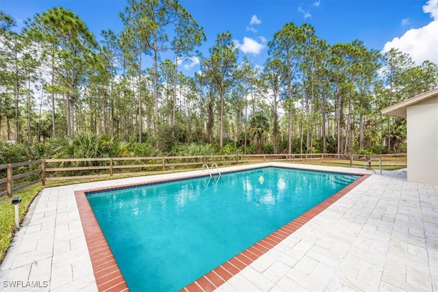 view of pool with a patio area