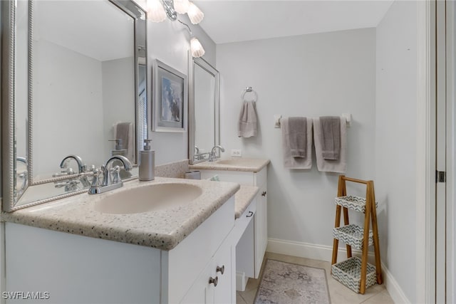 bathroom with vanity and tile patterned floors