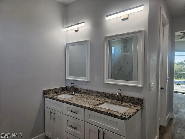 bathroom featuring vanity and hardwood / wood-style flooring