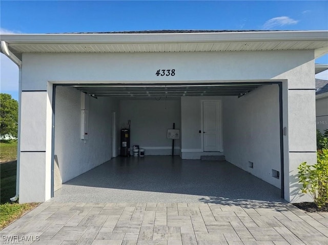 garage featuring water heater