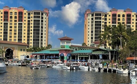 view of building exterior with a water view