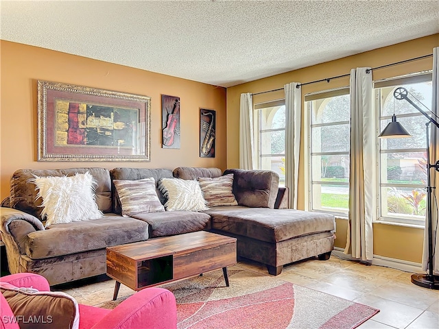 living room with a textured ceiling