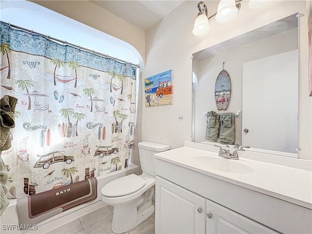 full bathroom with tile patterned floors, vanity, shower / bath combo, and toilet