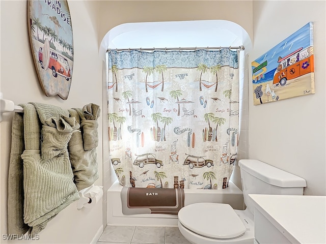 full bathroom with toilet, shower / bath combo, vanity, and tile patterned floors