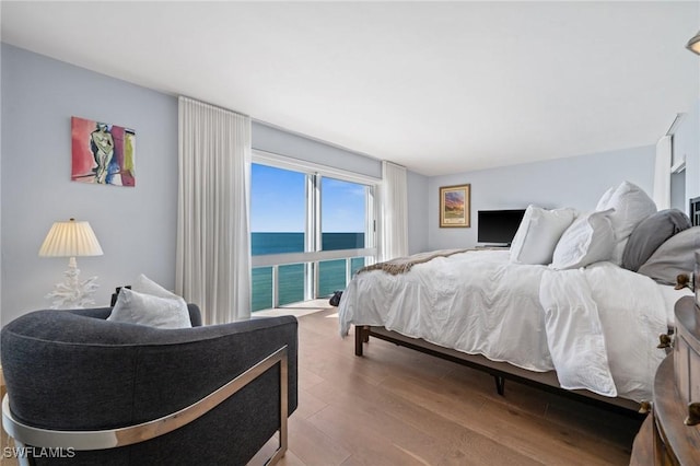 bedroom featuring wood finished floors