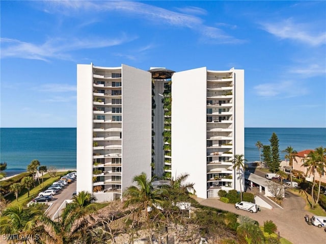 view of building exterior with a water view