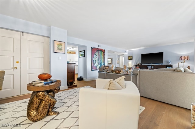 living room featuring light wood-type flooring