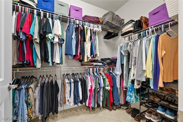 spacious closet with tile patterned flooring