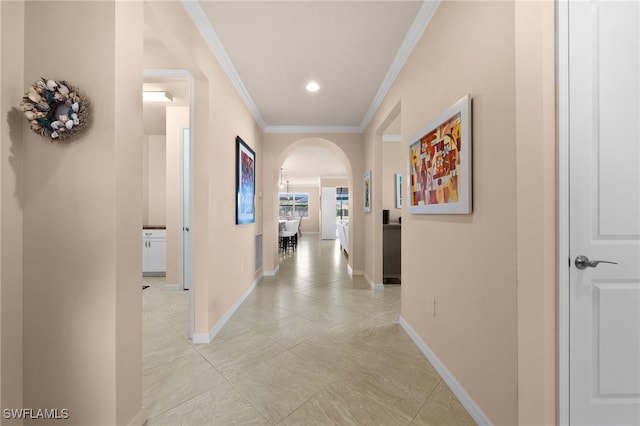 hallway featuring ornamental molding