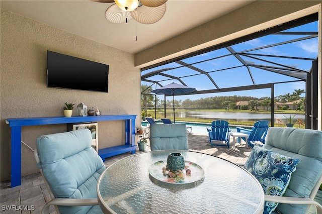 view of patio featuring a lanai