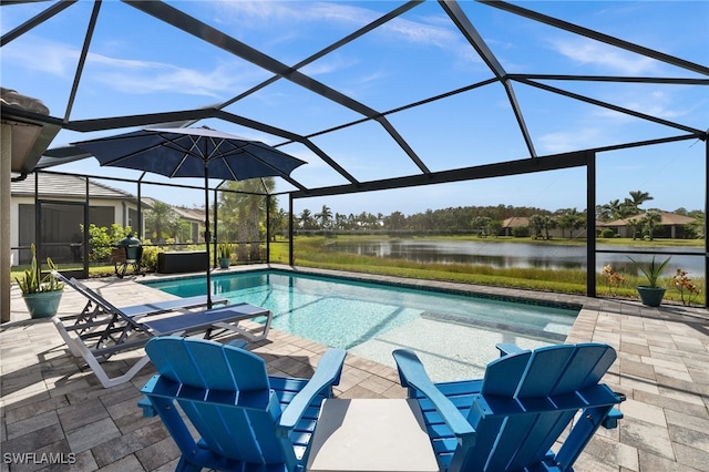 view of swimming pool with a water view, a patio area, and a lanai