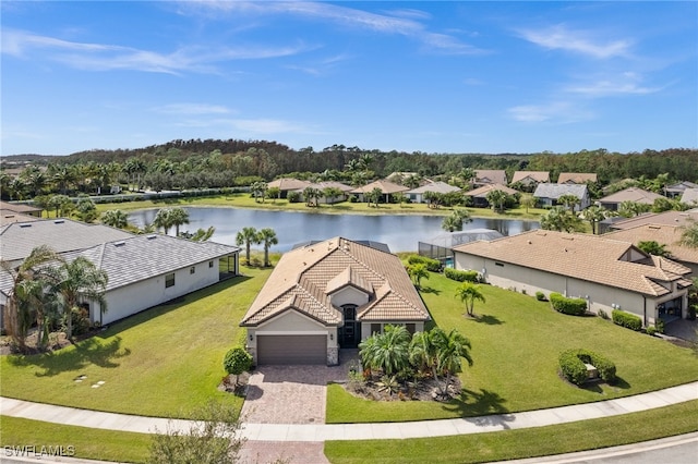 bird's eye view with a water view