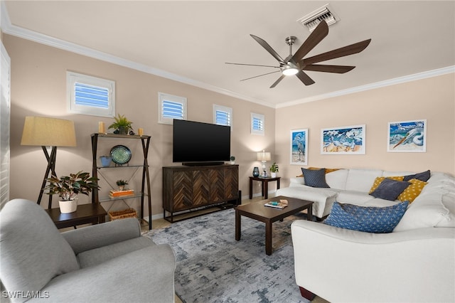 living room featuring ceiling fan and crown molding