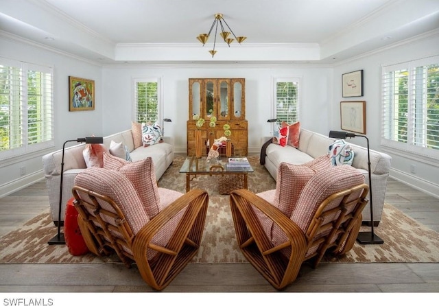 370 11th Ave S Unit 2, Naples, FL 34102 - sitting room featuring a tray ceiling, crown molding, and wood finished floors