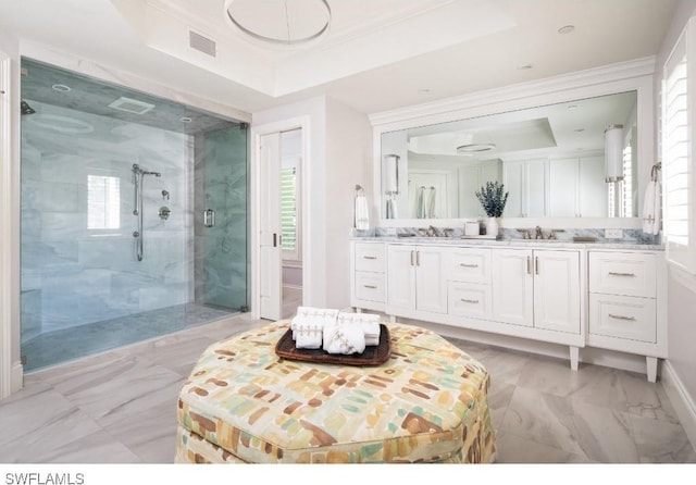 370 11th Ave S Unit 2, Naples, FL 34102 - bathroom with a tray ceiling, a stall shower, marble look tile flooring, healthy amount of natural light, and ornamental molding