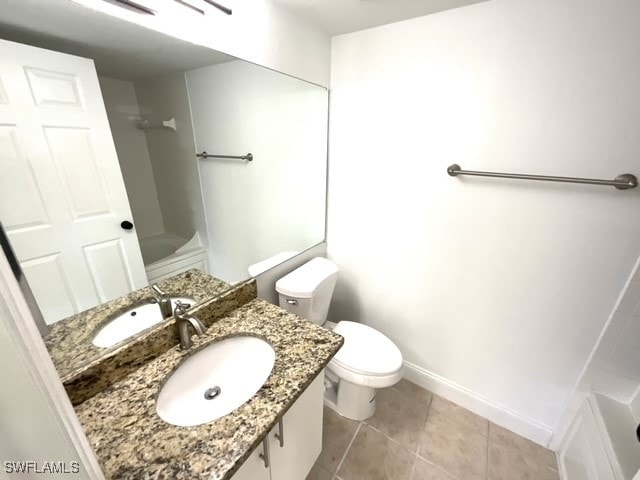 full bathroom featuring vanity, toilet, tile patterned floors, and shower / bathing tub combination