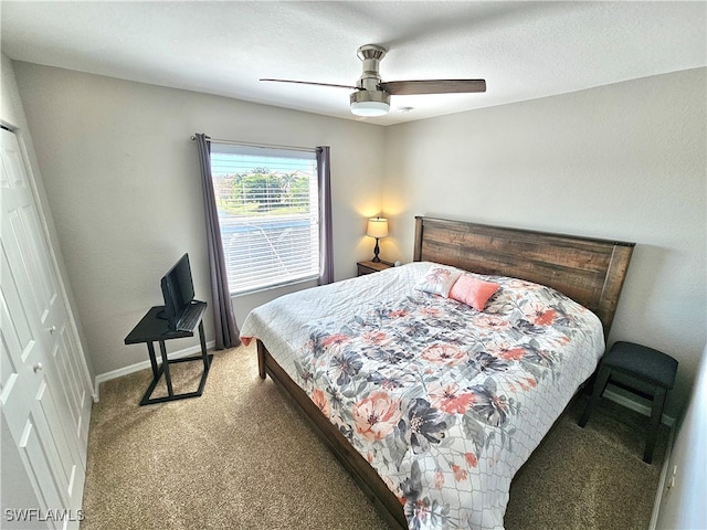 bedroom with a closet, ceiling fan, and carpet flooring